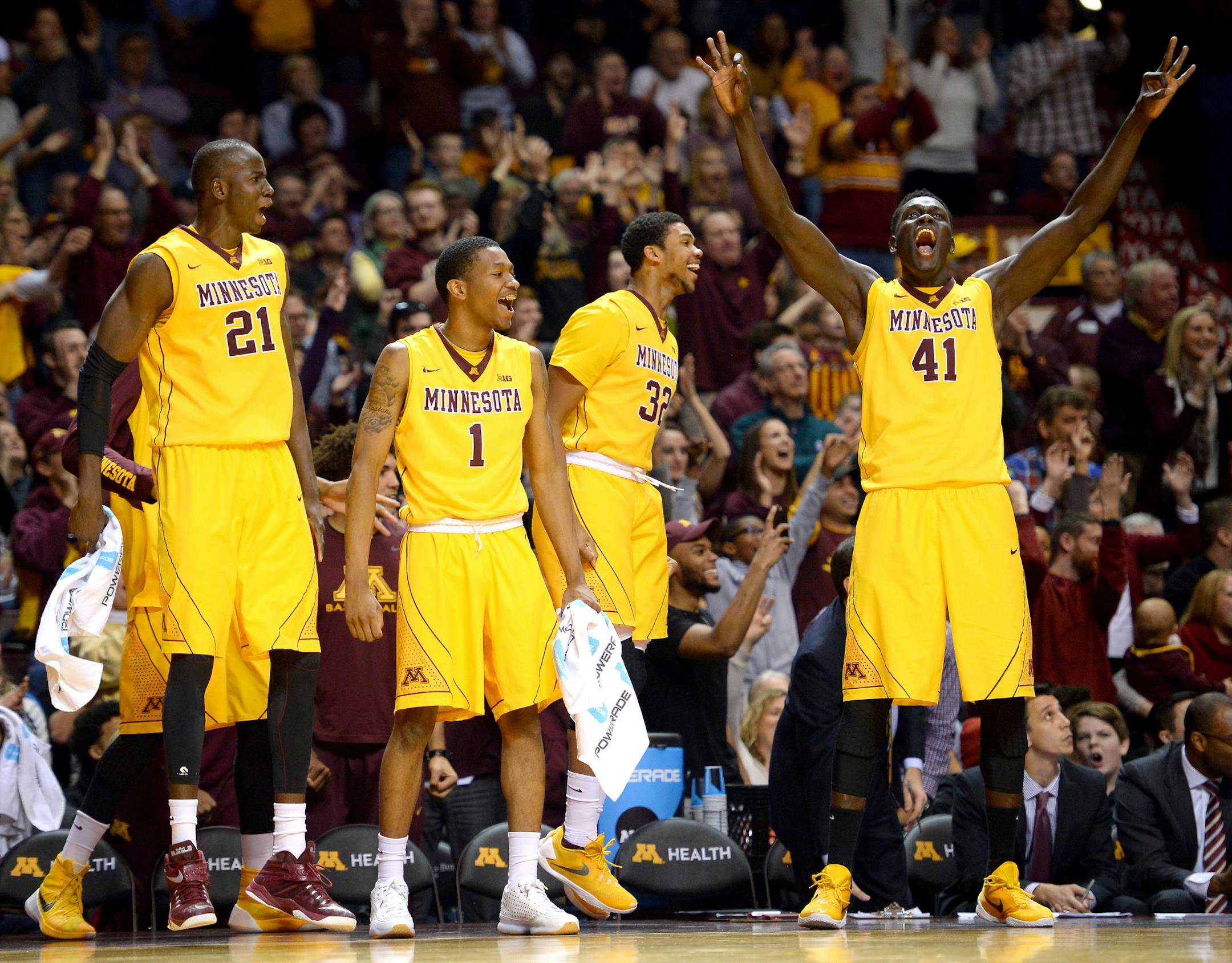 The Minnesota Golden Gophers bench erupted after a 3-point shot made by Minnesota Golden Gophers guard Nate Mason (2) in the second half against the Michigan State Spartans Saturday. ] (AARON LAVINSKY/STAR TRIBUNE) aaron.lavinsky@startribune.com The University of Minnesota Golden Gophers men's basketball team played the Michigan State Spartans on Saturday, Jan. 2, 2016 at Williams Arena in Minneapolis, Minn.