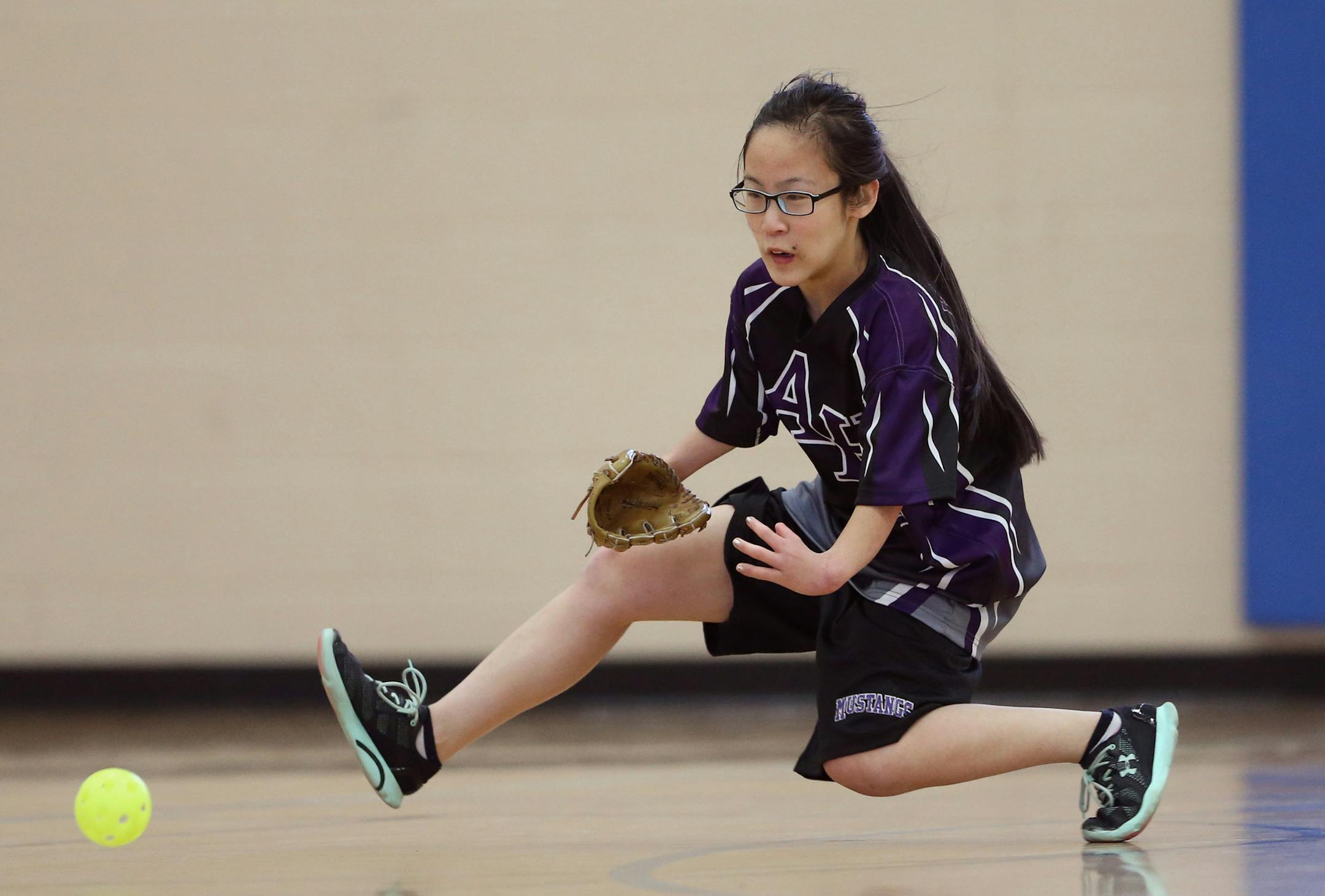 Hana France fielded a ball and threw it to fist base Tuesday 17, 2016 in New Brighton, MN.] Siblings Stevey France, Kai France, Mia France, and Hana France are members of the Anoka-Hennepin adapted softball team they played Mounds View/Irondale/Rosedale at Highview Middle School. Jerry Holt /Jerry.Holt@Startribune.com