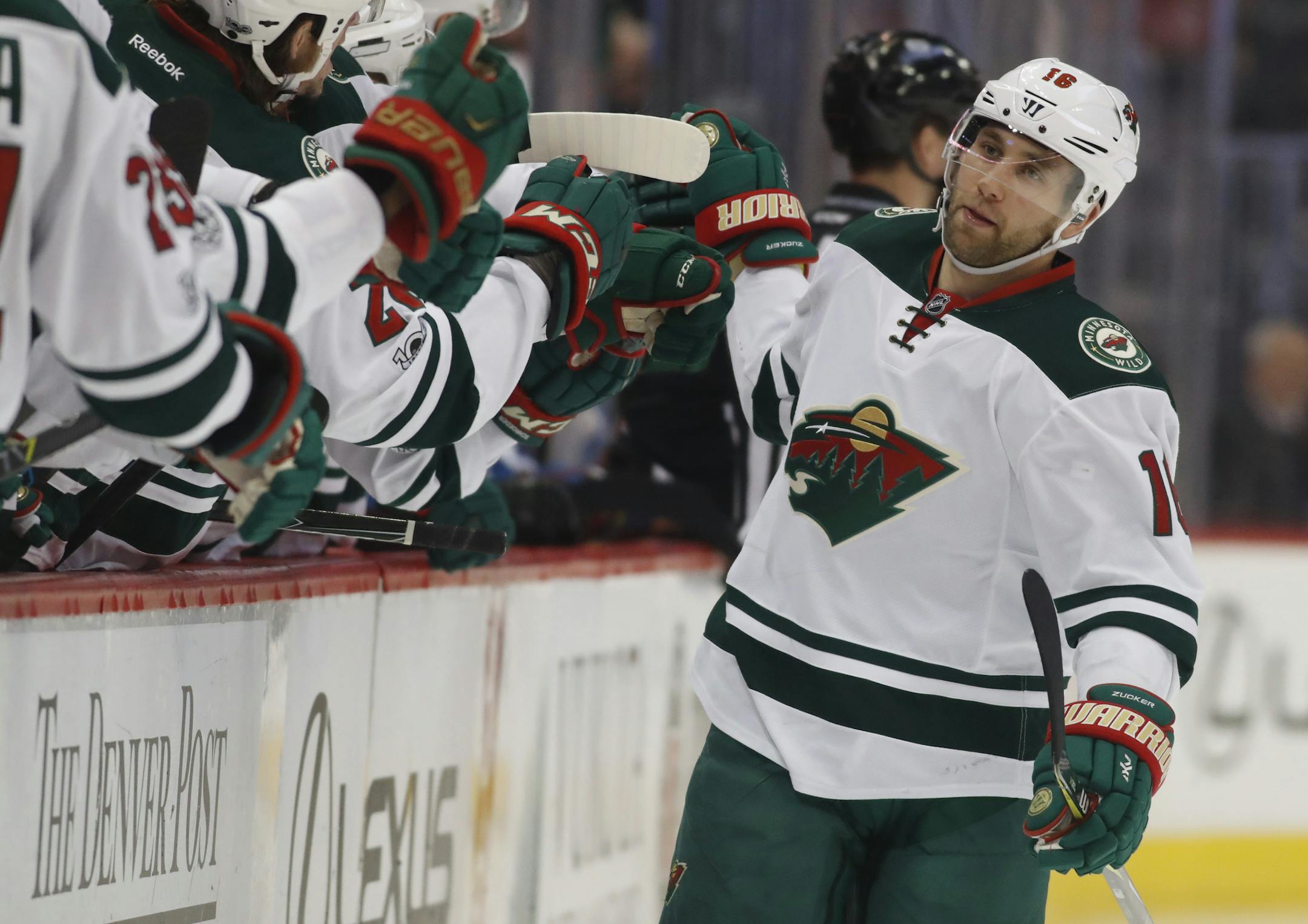 Minnesota Wild left wing Jason Zucker is congratulated after scoring a goal against Colorado last season.