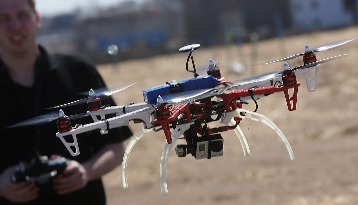 Realtor Brandon Doyle demonstrated a drone equipped with a small, HD camera that he uses to photograph real estate listings.