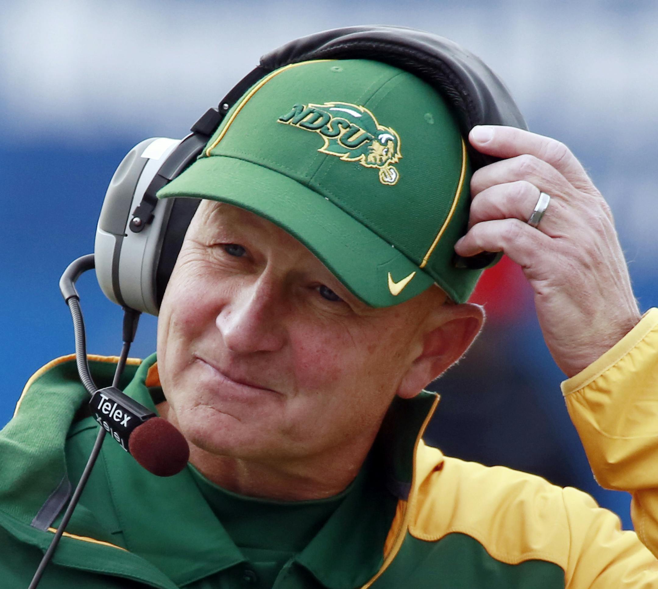 FILE - This Oct. 26, 2013 file photo shows North Dakota State head coach Craig Bohl during the second half of an NCAA college football game against Indiana State in Terre Haute, Ind. Coach Bohl will continue to guide the team though the Football Championship Subdivision playoffs even though he has taken the job at Wyoming, the school's athletic director said Sunday Dec. 8, 2013. (AP Photo/Brent Smith, file)