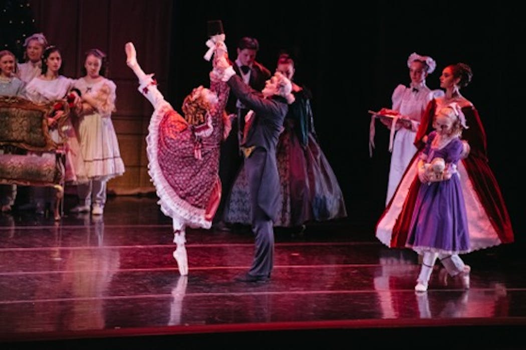 Flannery Page (Clara) and Robert Cleary (Herr Drosselmeyer) in Ballet Minnesota's 'The Classic Nutcracker.' Cleary returns as Drosselmeyer for the 25th year this season.