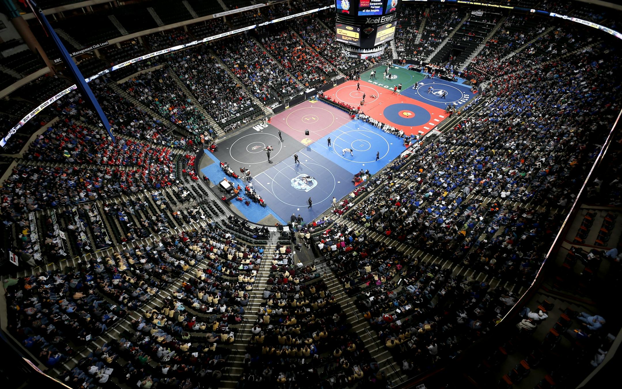 Wrestlers competed during the opening day of the Minnesota high school wrestling state tournament at Xcel Energy Center on Thursday.