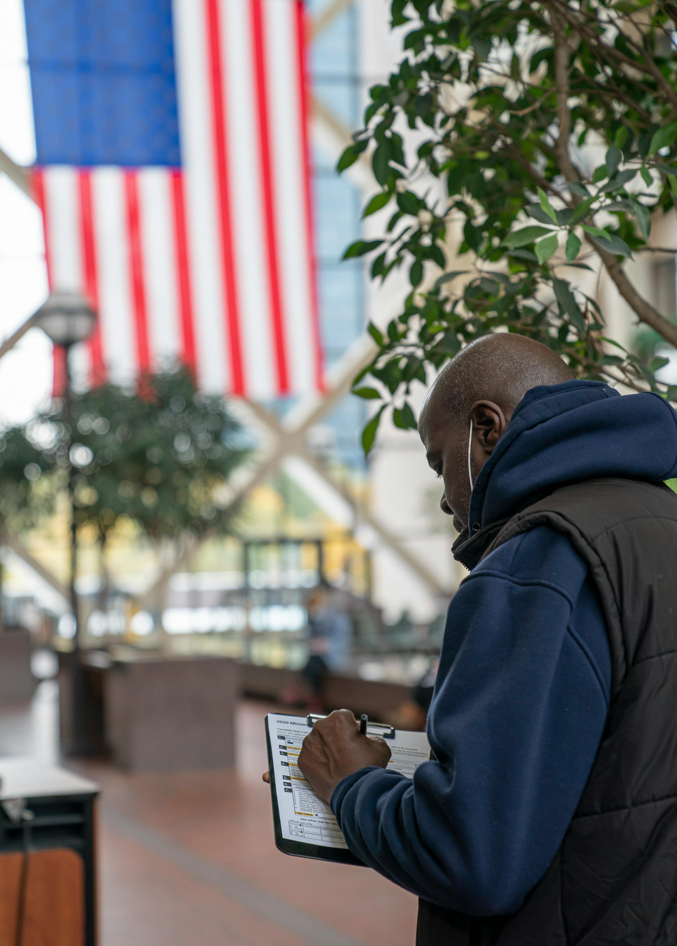 Antoine Thornton filled out his ballot application Wednesday at the Hennepin County Government Center. ] GLEN STUBBE • glen.stubbe@startribune.com Wednesday, October 21, 2020 Voting data analyzed by the Star Tribune finds voter turnout in the precincts with the highest concentration of Black voters dropped from 2012, when Barack Obama easily carried the state, to 2016, when Hillary Clinton nearly lost it. In a presidential election year that also saw a nationwide reckoning over race originate in