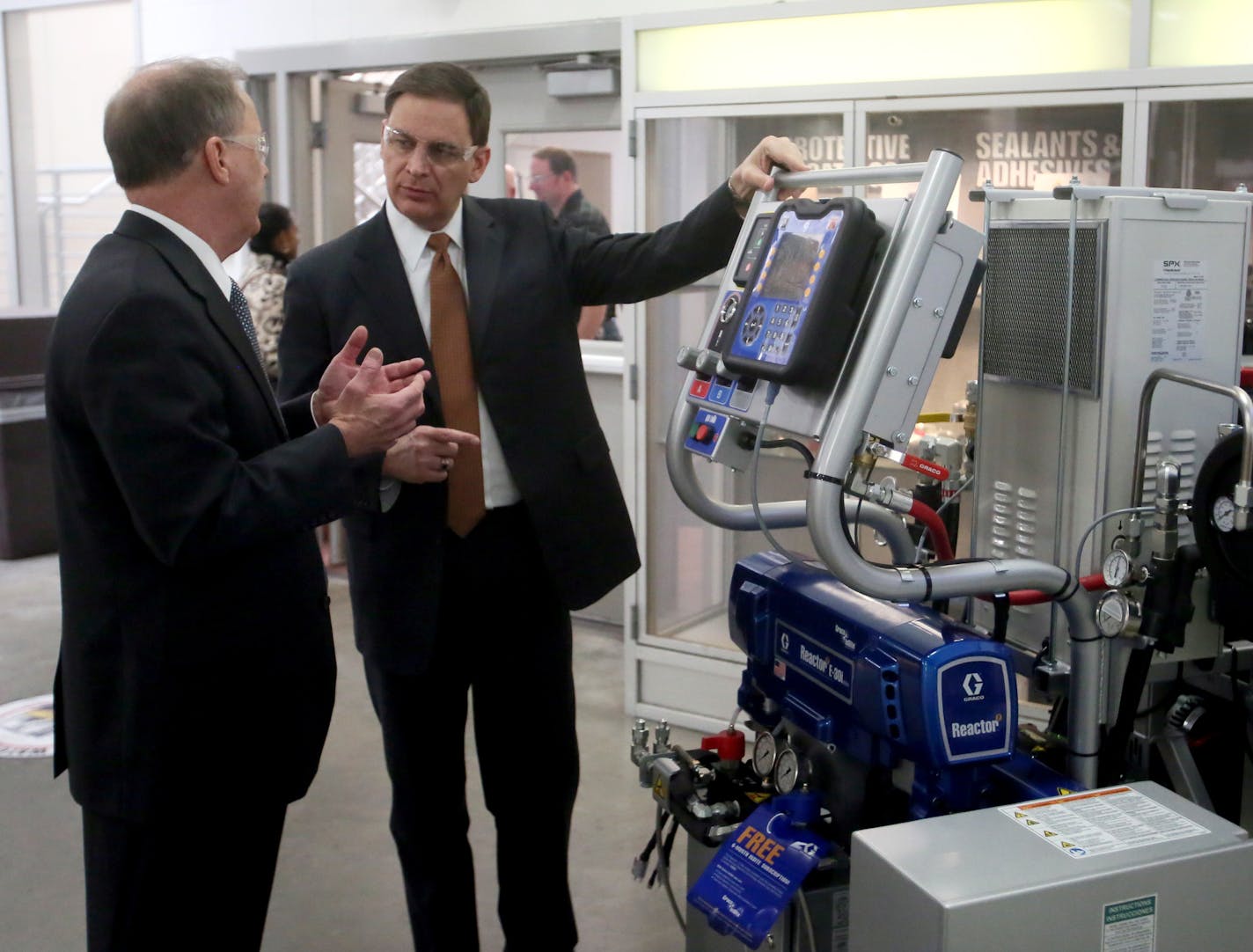 National Association of Manufacturers President Jay Timmons, right, toured the Graco factory in Minneapolis, accompanied by Chuck Rescorla, vice president of corporate manufacturing at Graco, left, Wednesday, Feb. 4, 2015, in Minneapolis, MN.](DAVID JOLES/STARTRIBUNE)djoles@startribune.com National Association of Manufacturers President Jay Timmons spoke about the state of manufacturing in America before the Economic Club of Minnesota at the Minneapolis Convention Center. Timmons later toured Gr