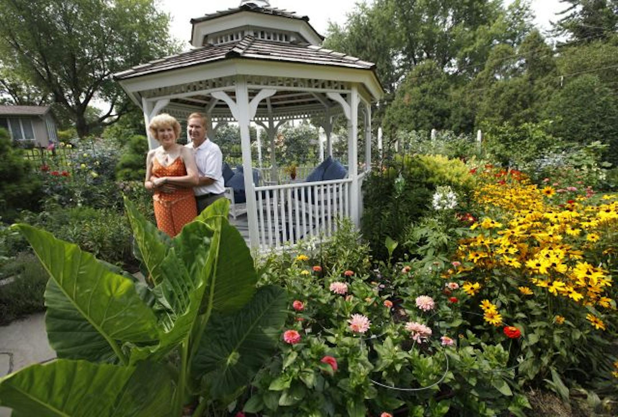 Dianne and Dan Latham in their garden