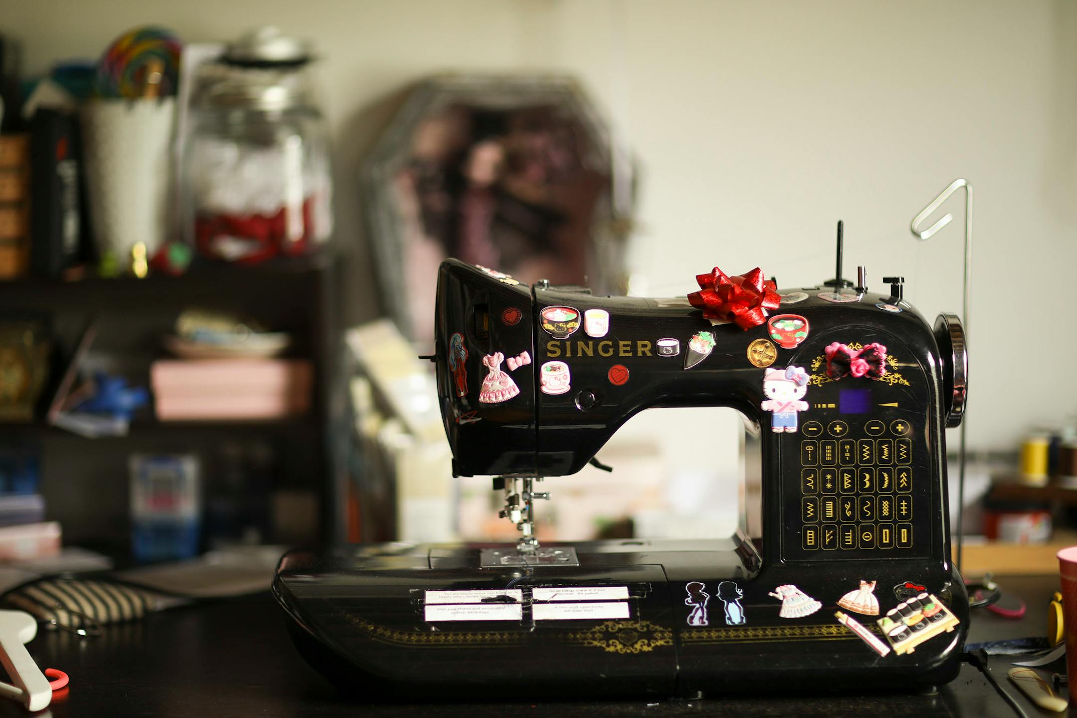 A sewing machine that was a gift from her parents in the studio of Minneapolis designer Samantha Rei.