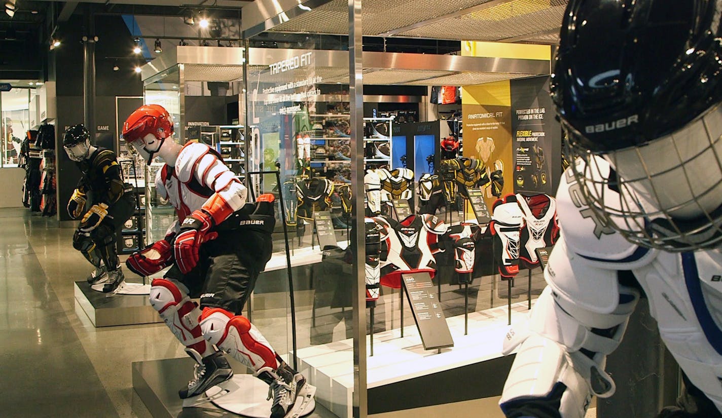 The store, near Interstates 35W and 494, has Bauer hockey equipment but will feature other retailers as well.