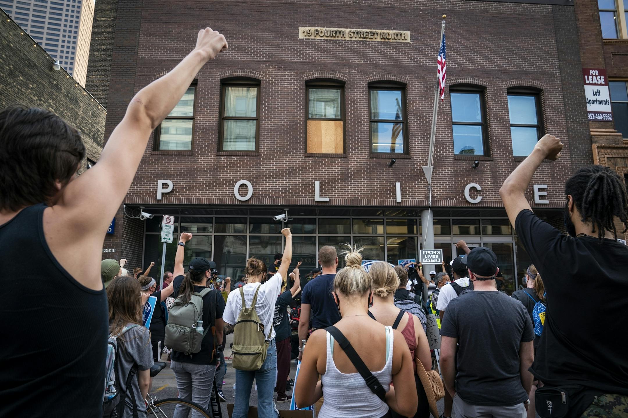 Protesters rallied downtown in front of the Minneapolis Police Department's First Precinct.