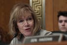 Sen. Tina Smith, D-Minn., speaks during an executive session of the Senate Health, Education, Labor and Pensions Committee on Capitol Hill in Washingt