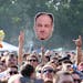 Concert goers display a photo of actor James Gandolfini during Day 2 of the Firefly Music Festival at The Woodlands on Saturday, June 22, 2013 in Dove