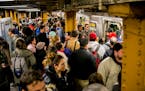 More Americans means more money spent and more progress made. Passengers navigate a crowded subway platform as they get on and off the L train at Unio