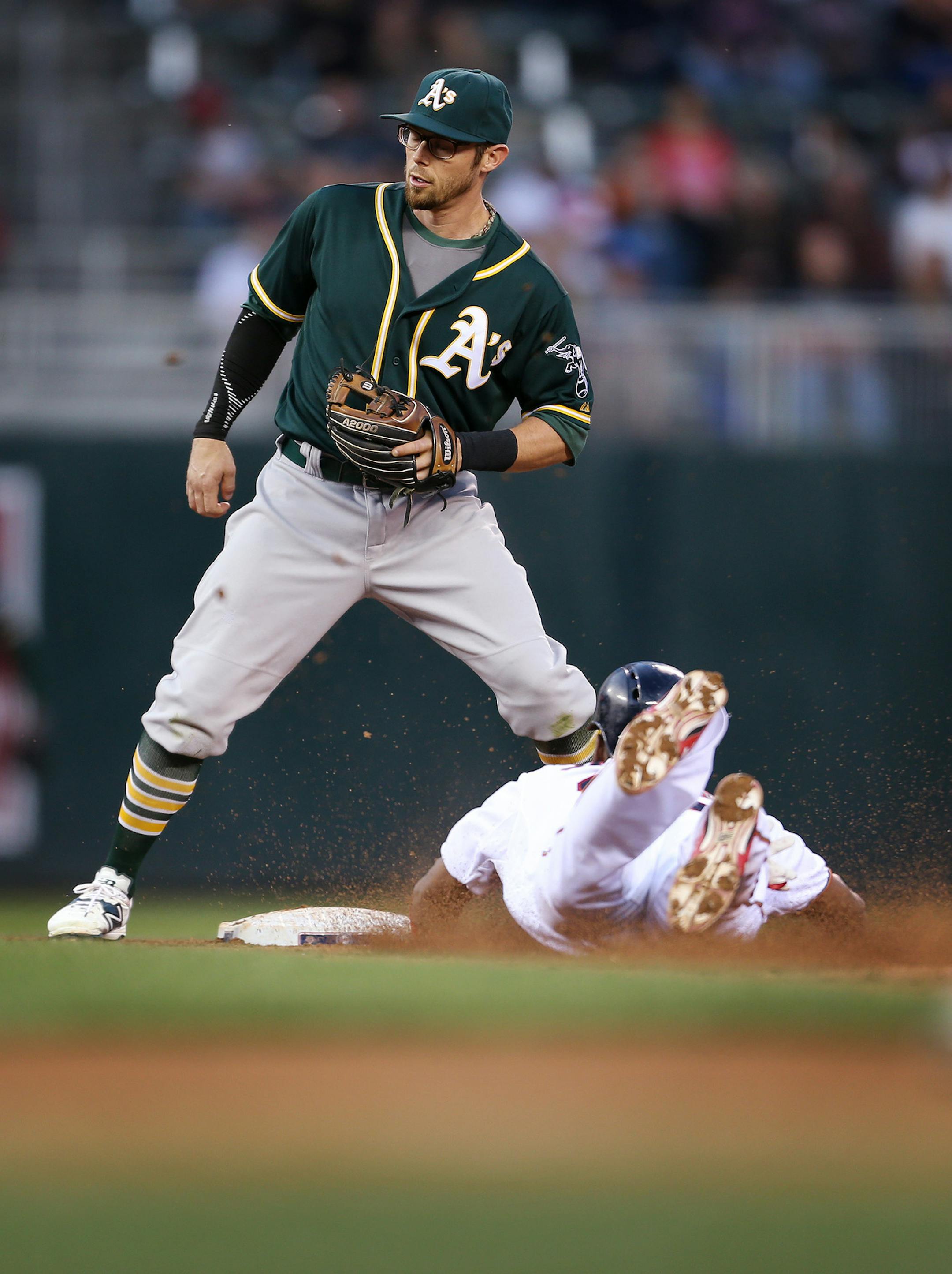 Danny Santana of the Twins easily steals second base against Eric Sogard of the Oakland Athletics at Target Field in Minneapolis on Monday, May 4, 2015. ] LEILA NAVIDI leila.navidi@startribune.com /