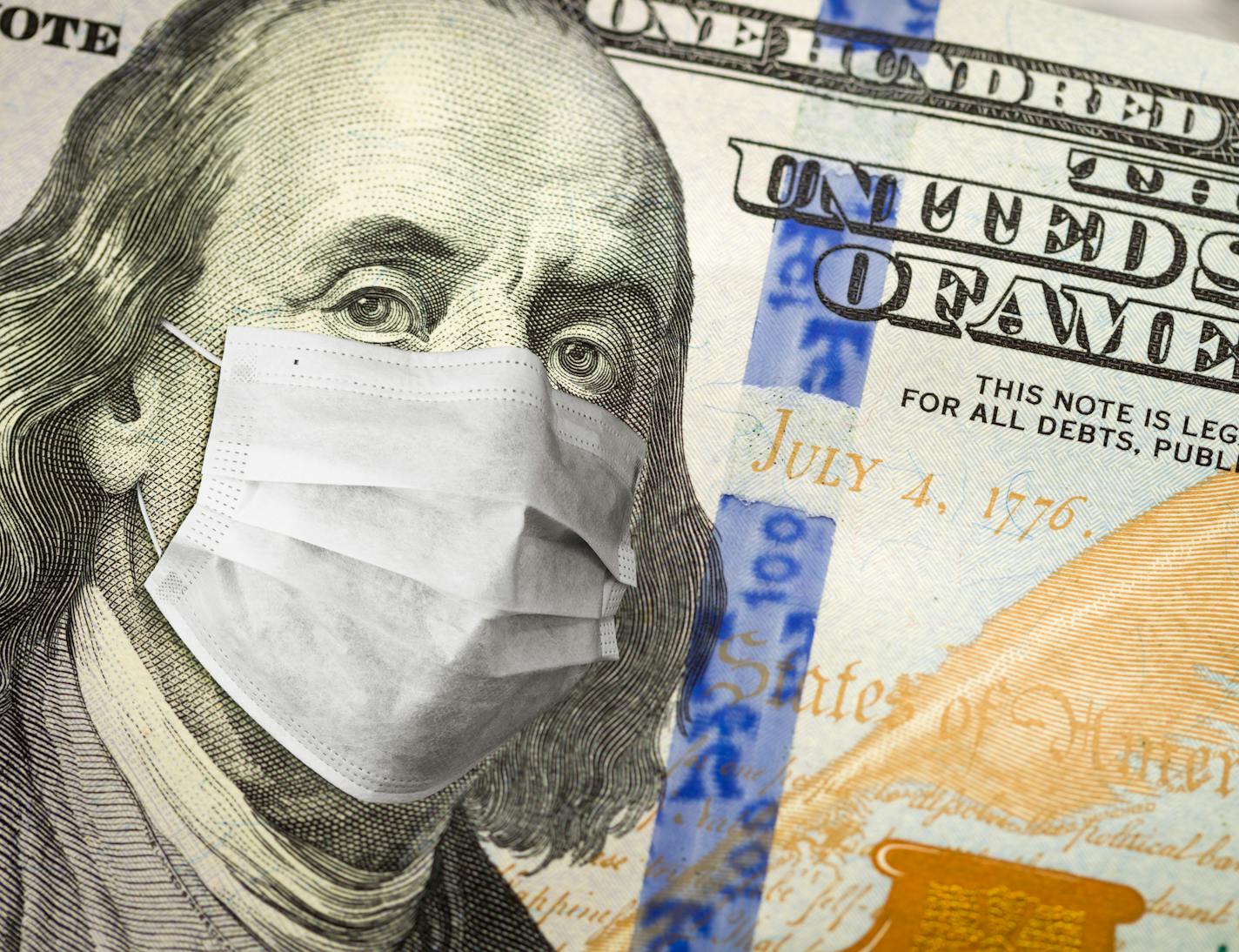 One Hundred Dollar Bill With Medical Face Mask on George Washington.