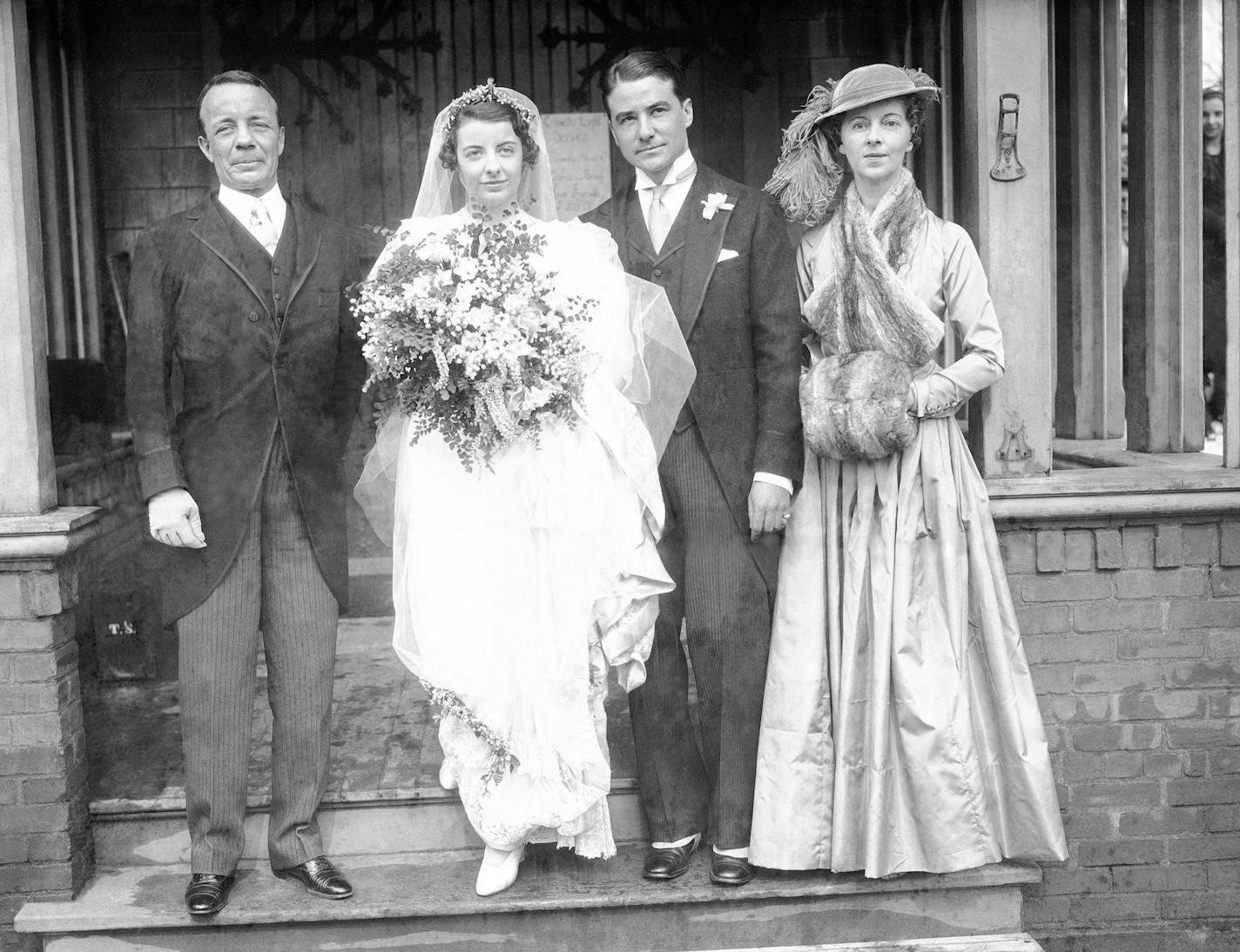 This wedding group was photographed at the little country church at Oyster Bay, New York, after the wedding of Miss Grace Green Roosevelt, daughter of Col. Theodore Roosevelt Jr., left, to William McMillan of Baltimore, March 3, 1934. Left to right: Col. Roosevelt, Grace, William, and Eleanor Butler Alexander Roosevelt, wife of the Col. (AP Photo) ORG XMIT: APHS128546