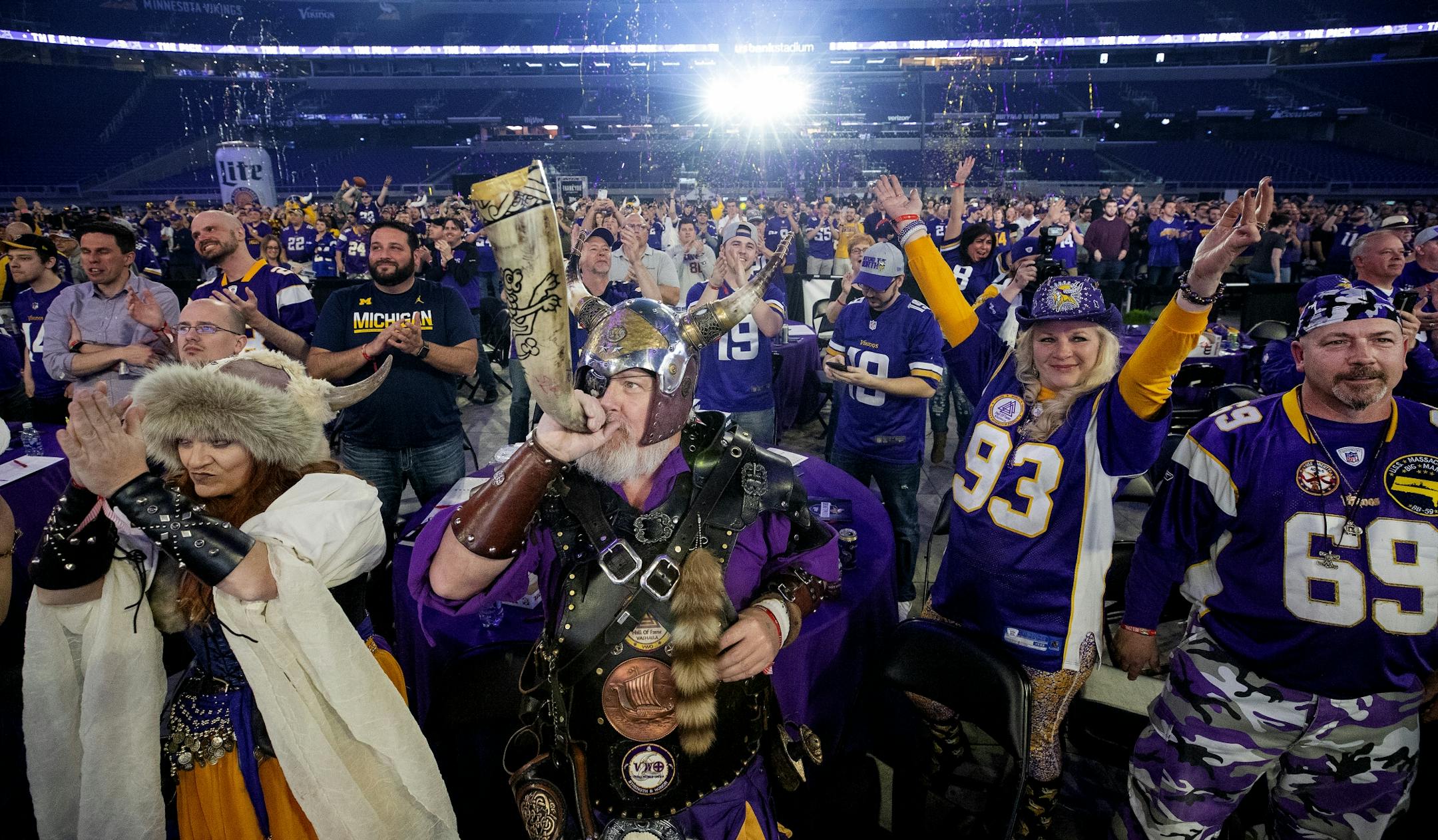 Teri "Freyja" Hanson and Greg "Sir Odin" Hanson of Watkins, MN cheered after the Vikings selected Central Florida CB Mike Hughes in the first round during the Minnesota Vikings draft party held at US Bank Stadium.