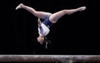 Auburn's Suni Lee competes on the balance beam during the NCAA women's gymnastics championships Thursday in Fort Worth, Texas.