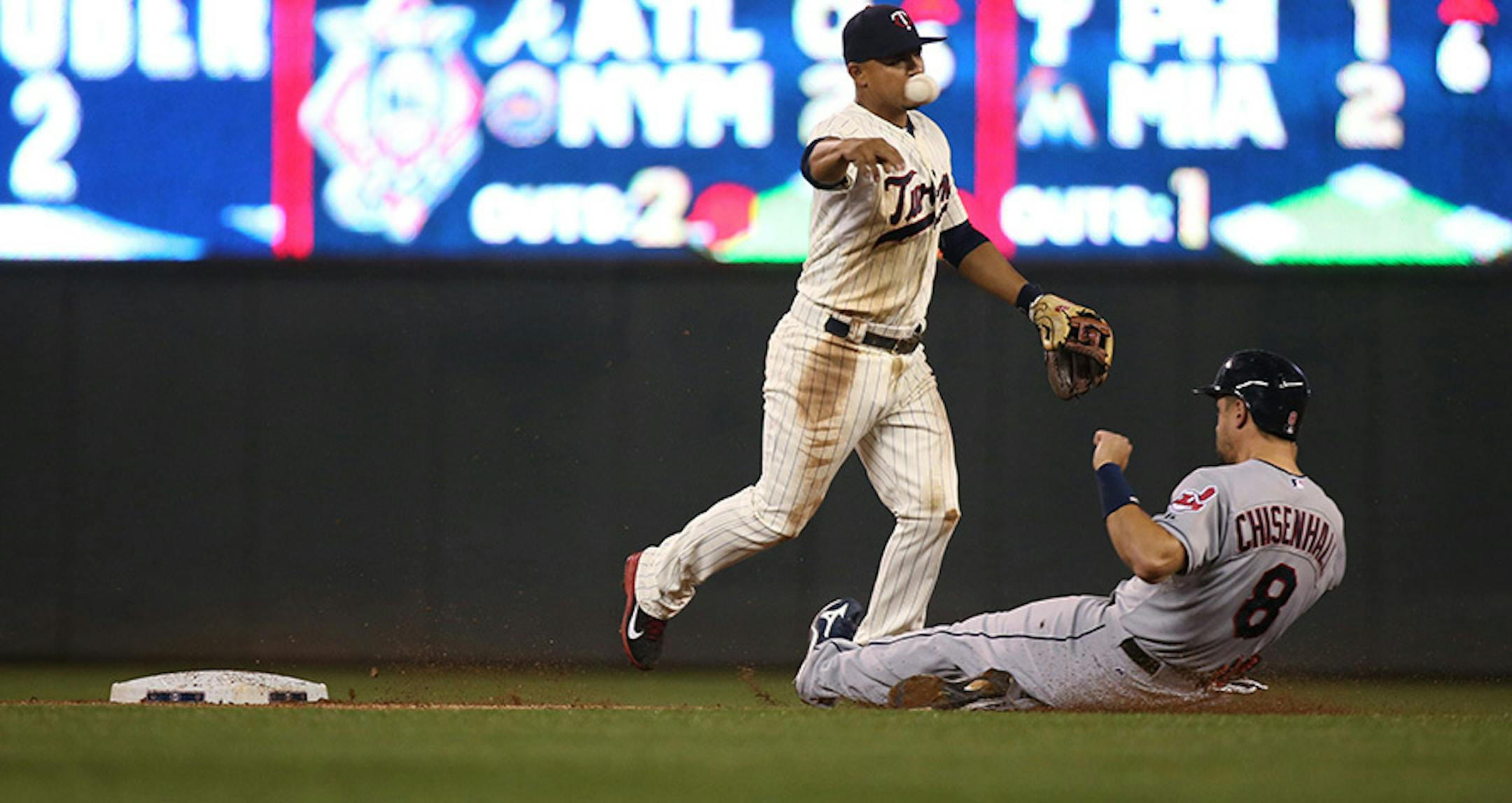 Twins Eduardo Escobar threw to Joe Mauer at first base to complete a double play in the second inning.