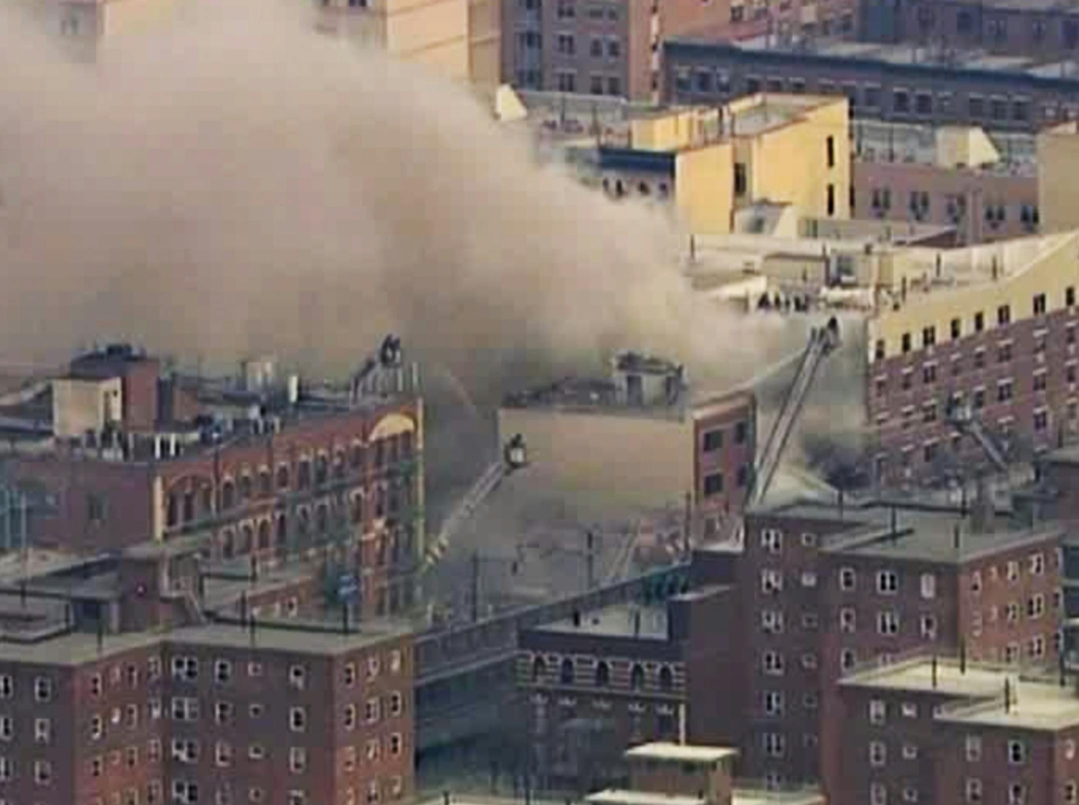 In this image taken from video from WABC, firefighters battle a blaze at the site of a possible explosion and building collapse in the East Harlem neighborhood of New York, Wednesday, March 12, 2014.
