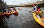 Kayakers prepared for water to drain in the Upper St. Anthony Falls Lock on the Mississippi river in Minneapolis in 2015. While this section of the ri