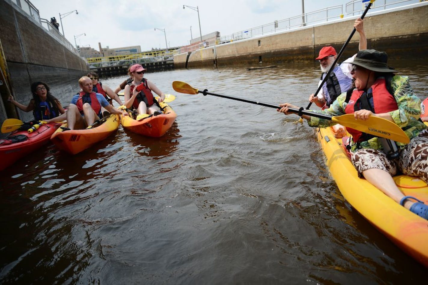 Kayakers prepared for water to drain in the Upper St. Anthony Falls Lock on the Mississippi river in Minneapolis in 2015. While this section of the river is now closed, a new "paddle share" would allow visitors to paddle a 4-mile corridor of the Mississippi that winds through the Twin Cities from Dayton to Hastings.