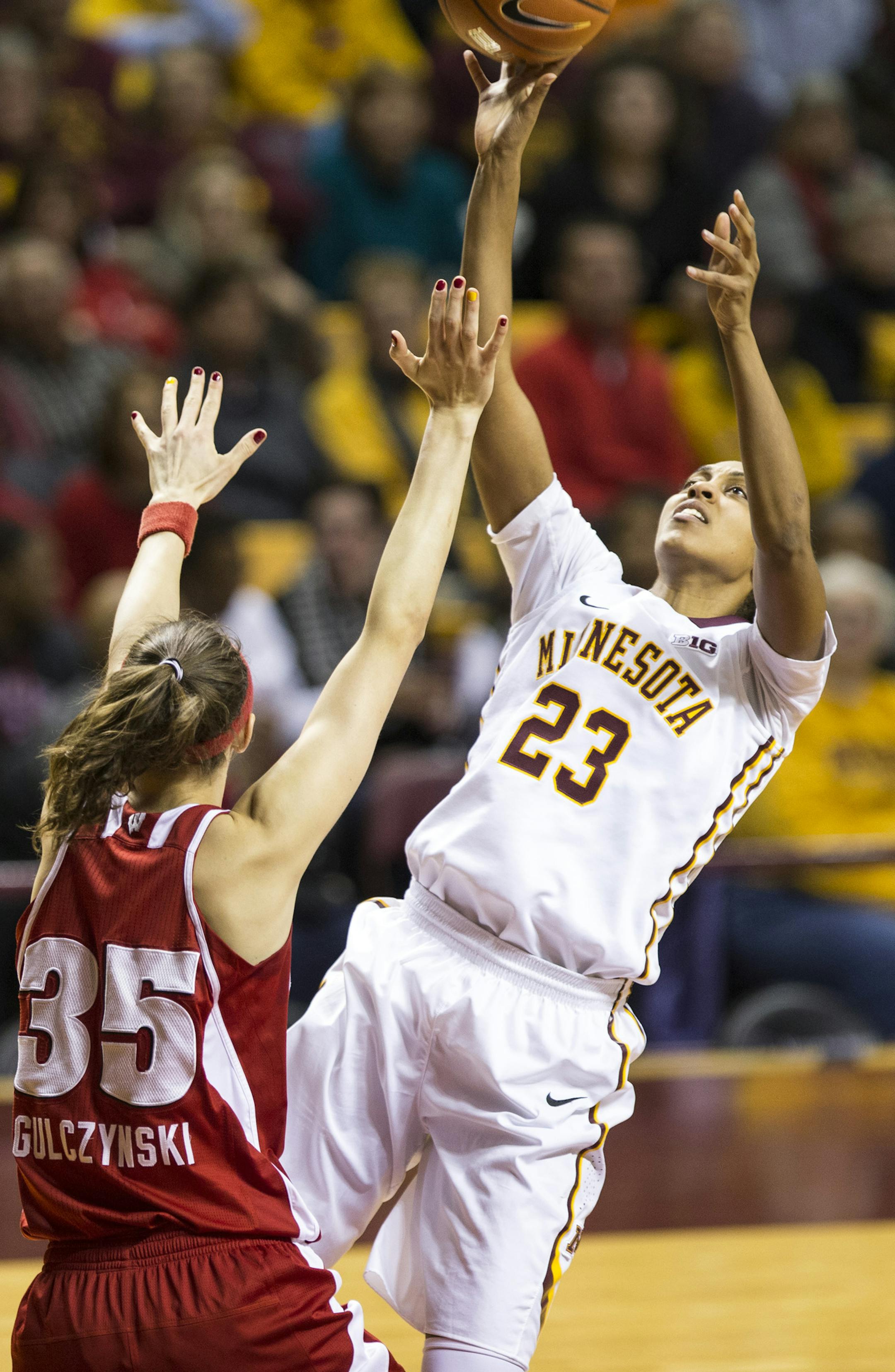 Gophers Shae Kelley (23) went for a shot against Badgers Jacki Gulczynski (35) during the first half. ] RENEE JONES SCHNEIDER • reneejones@startribune.com Gophers women's basketball verses the Wisconsin Badgers on Wednesday, February 11, 2015 at Williams Arena in Minneapolis, Minn.