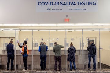 People took to the new saliva COVID-19 testing site at the Minneapolis-St. Paul International Airport, Thursday, November 12, 2020. The airport partne