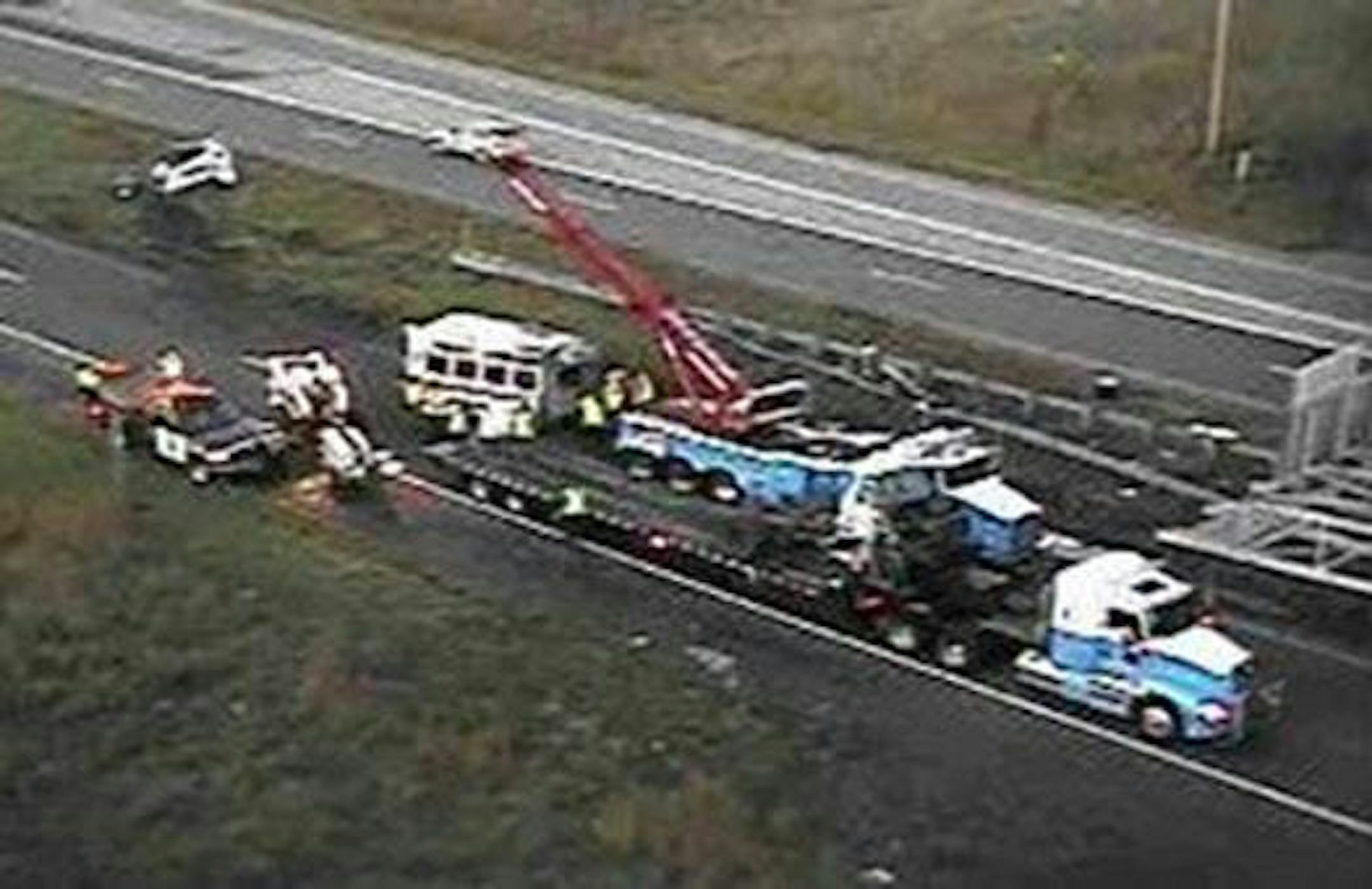 Crews worked at Interstate 35W and 95th Avenue in Blaine after a crash that killed two people and injured several others.