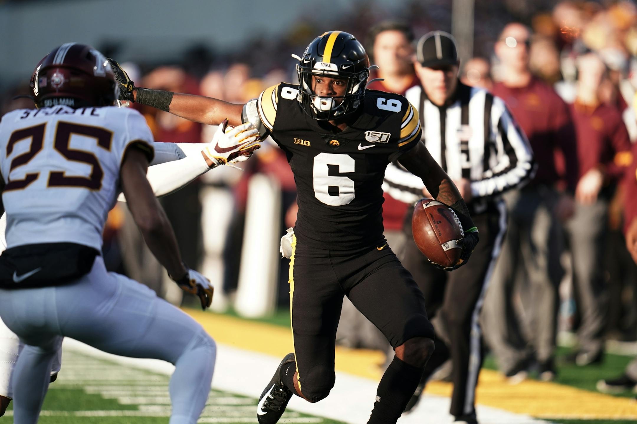 Iowa Hawkeyes wide receiver Ihmir Smith-Marsette (6) ran for a first down in the first quarter.
