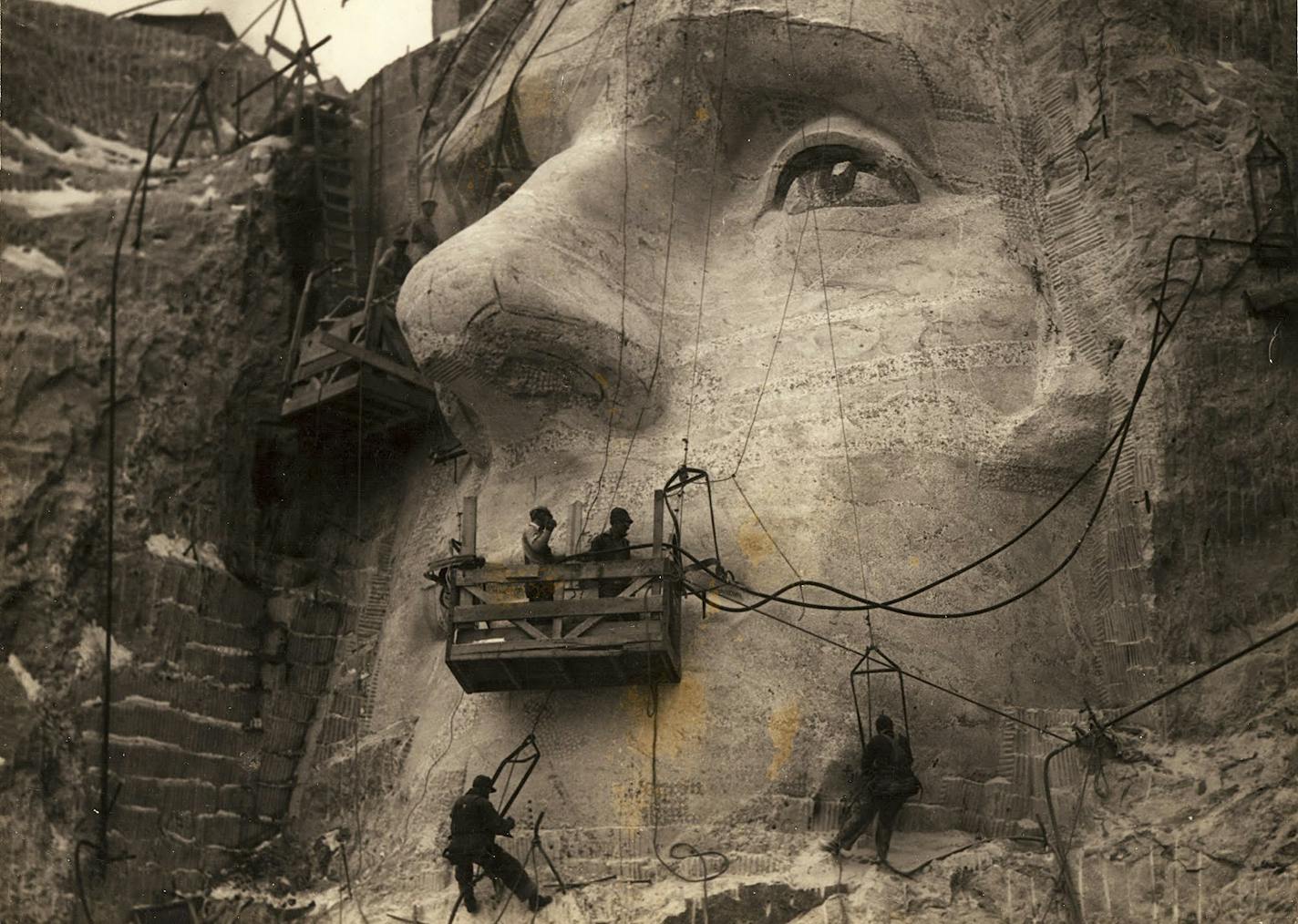 In an undated handout photo, Workers at Mount Rushmore. Luigi Del Bianco, the chief carver of the Mount Rushmore monument, was recognized in May by the National Park Service for the contribution he made to the monument.