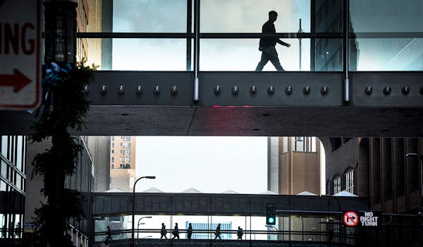Foot traffic passed through skyways above 8th Street South in downtown Minneapolis on Wednesday, Jan. 13, 2016.