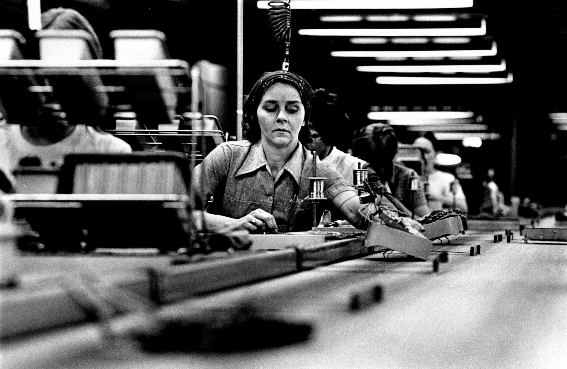1976: A woman works as an assembler at the E.F. Johnson citizens-band radio plant in Waseca.