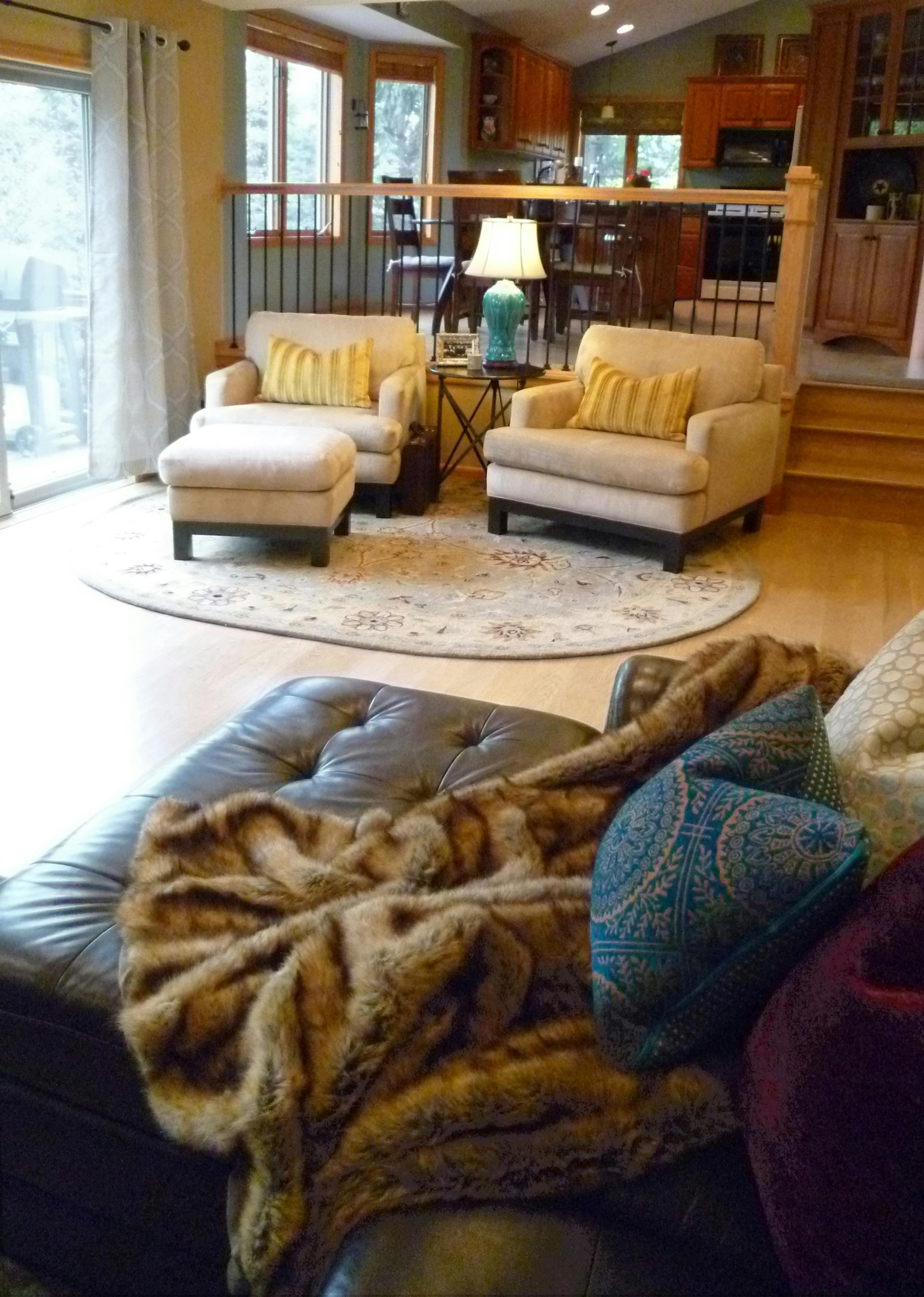 Family room in Woodbury was transformed by designer Jeralyn Mohr using spray paint, a piece of custom art and Craiglist finds.