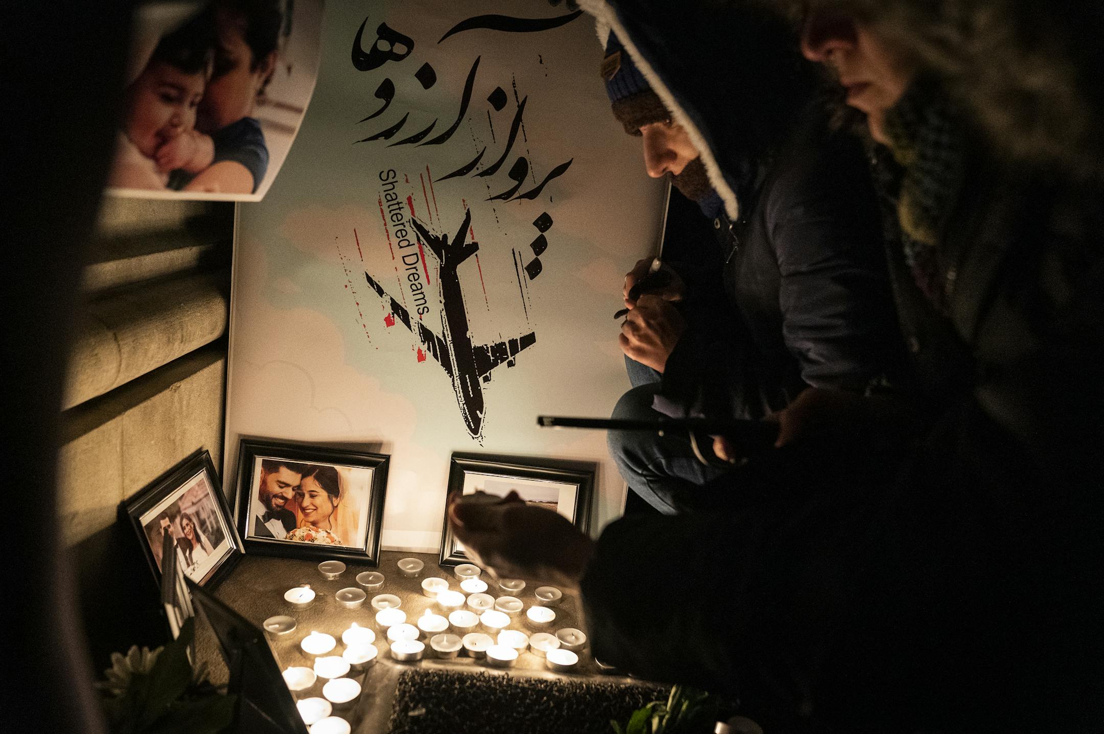 U of M PhD student Darya Biparva paid respects at a candlelight memorial for the victims of Ukraine International Airlines Flight 752 set up outside Northrop Auditorium. ] LEILA NAVIDI • leila.navidi@startribune.com BACKGROUND INFORMATION: A memorial was held for the victims of Ukraine International Airlines Flight 752 that was mistakenly shot down by the Iranian government after takeoff from Tehran airport at the University of Minnesota in Minneapolis on Wednesday, January 15, 2020.