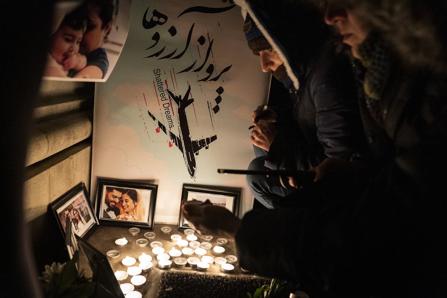 U of M PhD student Darya Biparva paid respects at a candlelight memorial for the victims of Ukraine International Airlines Flight 752 set up outside Northrop Auditorium. ] LEILA NAVIDI &#x2022; leila.navidi@startribune.com BACKGROUND INFORMATION: A memorial was held for the victims of Ukraine International Airlines Flight 752 that was mistakenly shot down by the Iranian government after takeoff from Tehran airport at the University of Minnesota in Minneapolis on Wednesday, January 15, 2020.