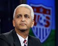 FILE - This Oct. 10, 2014, file photo shows Sunil Gulati, president of the United States Soccer Federation, during a press conference in Bristol, Conn