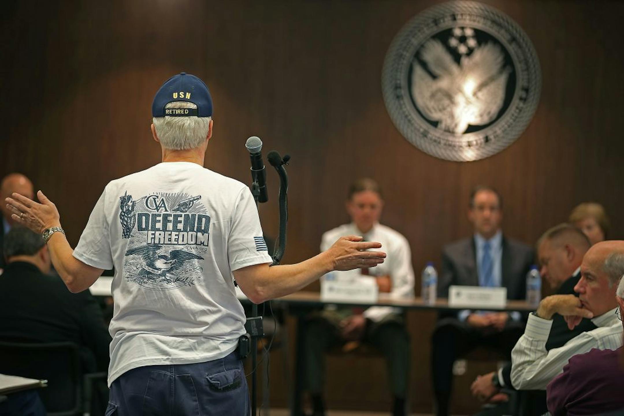 Military veteran James Brunsgaard voiced his concerns during a town hall meeting regarding health care and other veterans benefits at the Whipple Federal Building, Friday, September 12, 2014 in St. Paul, MN.