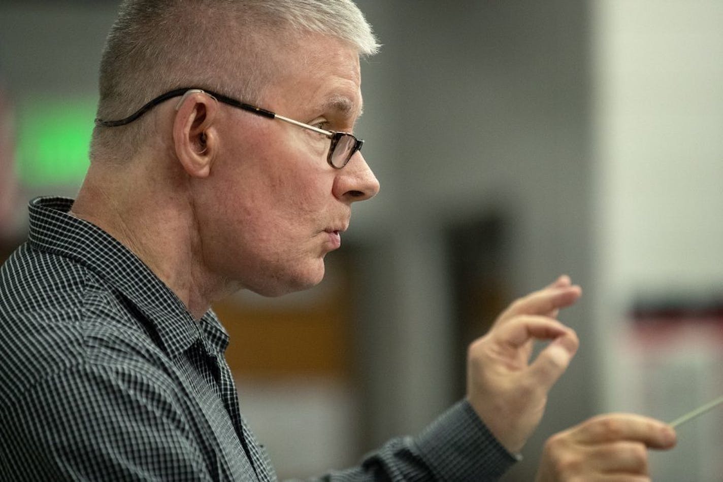 Steve Lyon and the SLP Community Band during their final rehearsal before they perform the piece he wrote about his cancer journey, "Melanomore," at the Minnesota Orchestra Hall.