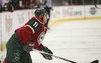 Wild left wing Zach Parise struggled to get to his feet after a hit into the boards in the first period of Thursday's game.