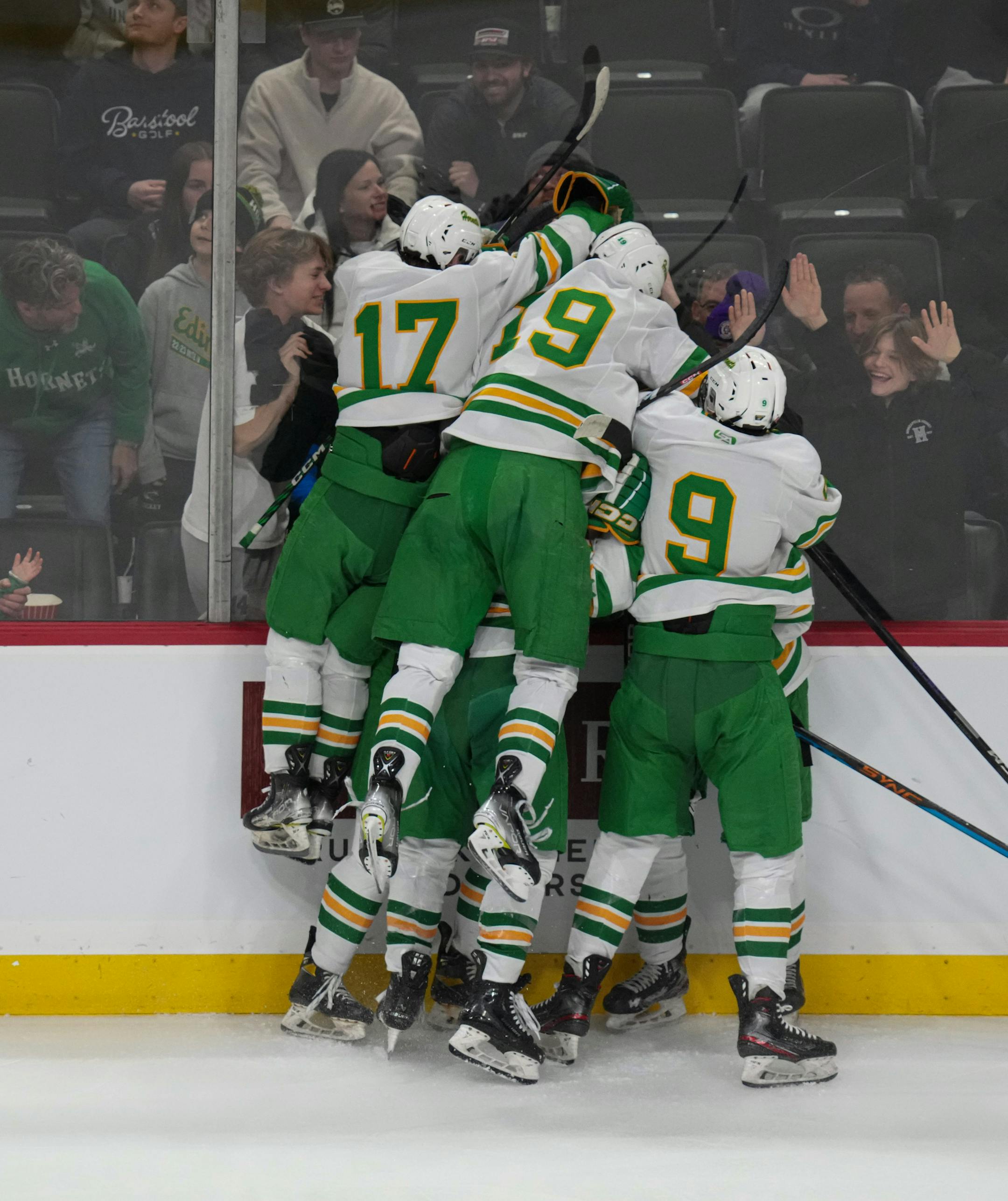 Players celebrated Edina's third goal in the second period.