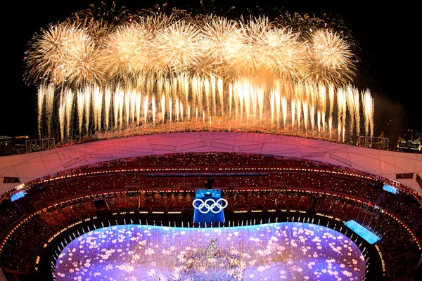 Fireworks light up the sky over Olympic Stadium during the closing ceremony of the 2022 Winter Olympics, Sunday, Feb. 20, 2022, in Beijing. (AP Photo/