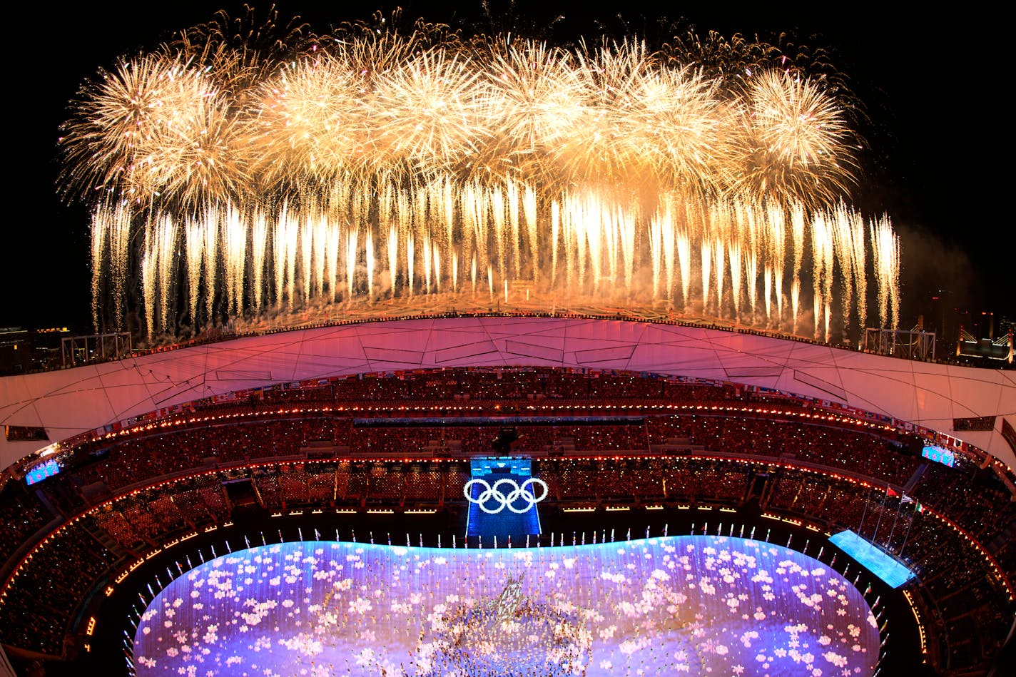 Fireworks light up the sky over Olympic Stadium during the closing ceremony of the 2022 Winter Olympics, Sunday, Feb. 20, 2022, in Beijing. (AP Photo/Jeff Roberson)