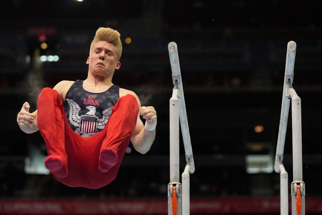 Shane Wiskus competed on the parallel bars on Saturday.
