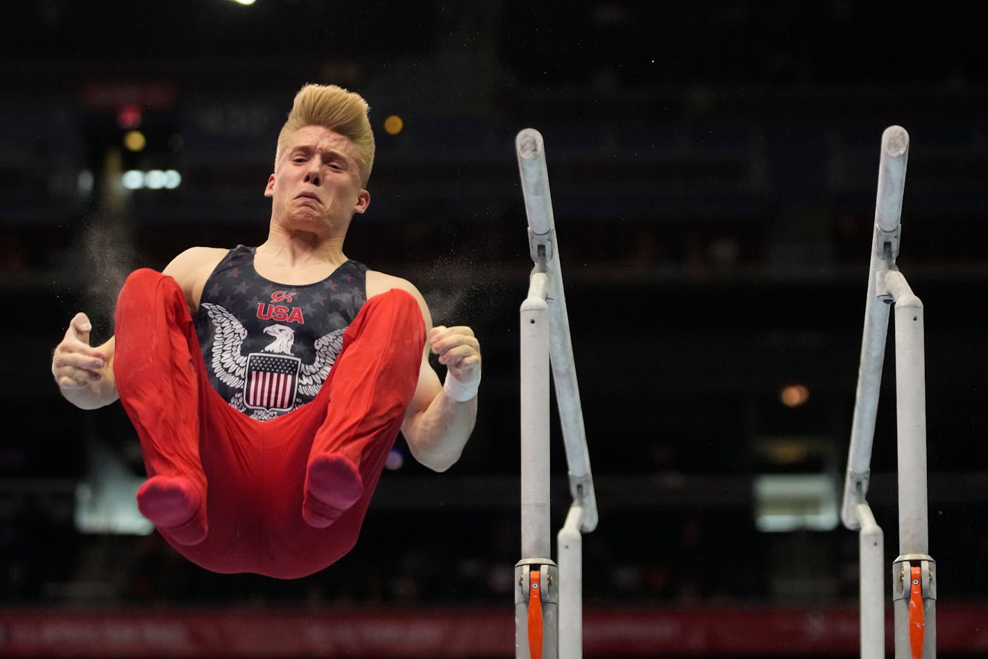 Shane Wiskus on the parallel bars competes during the men's U.S. Olympic Gymnastics Trials Saturday, June 26, 2021, in St. Louis. (AP Photo/Jeff Roberson)