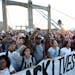 Protesters marched over the Hennepin Avenue bridge during a Black Lives Matter rally that started at Gold Medal Park in Minneapolis, Minn. On Wednesda