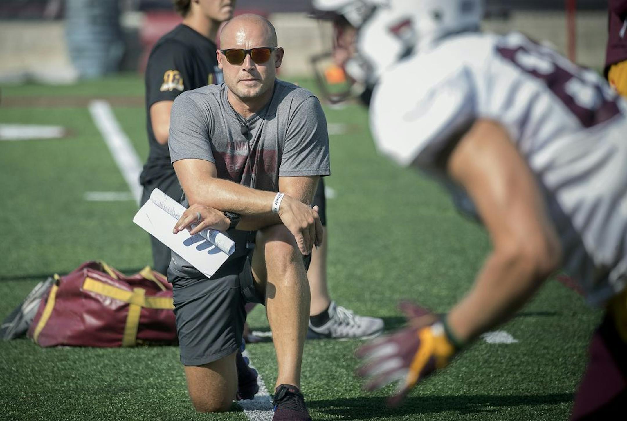 Minnesota Head Coach P.J. Fleck watched over practice earlier this month.