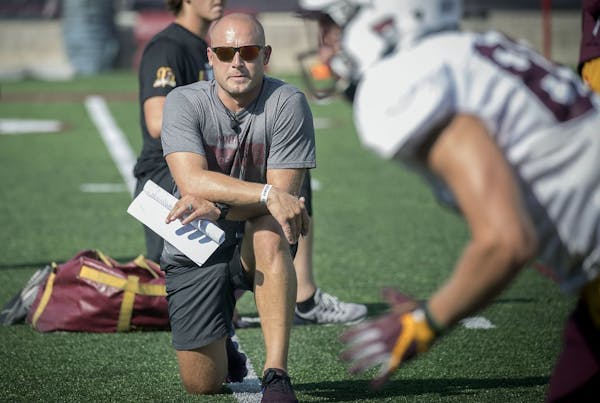 Minnesota Head Coach P.J. Fleck watched over practice earlier this month.