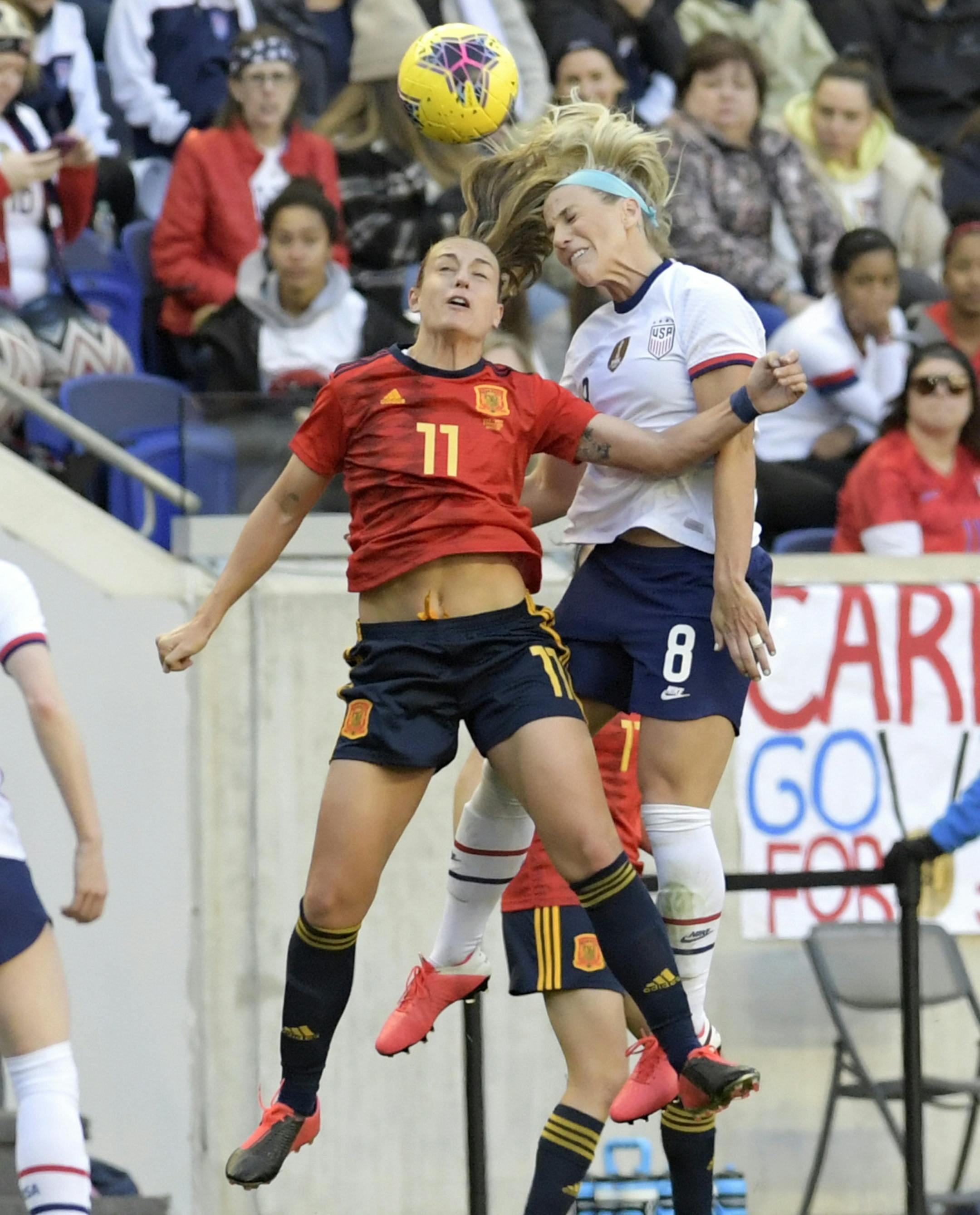Spain midfielder Alexia Putellas (11) and United States midfielder Julie Ertz (8) go up for a header during the first half of a SheBelieves Cup soccer match Sunday, March 8, 2020, in Harrison, N.J. (AP Photo/Bill Kostroun)