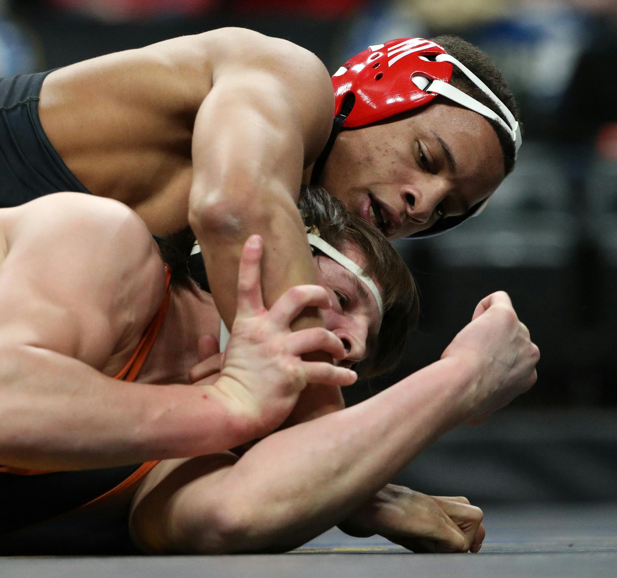 Simley/Inver Grove Heights' Daniel Kerkvliet, top, wrestled Delano's Steven Hajas in the Class AA 220lb championship match.] ANTHONY SOUFFLE ï anthony.souffle@startribune.com Wrestlers competed in the MSHSL state tournament Saturday, March 3, 2018 at the Xcel Energy Center in St. Paul, Minn.