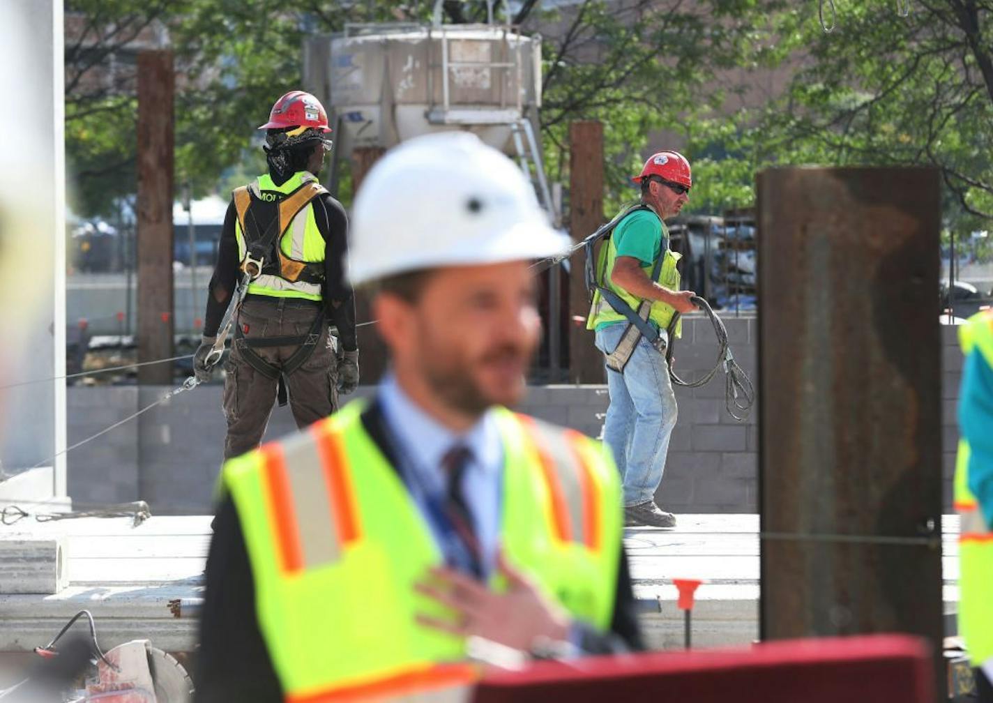 Hennepin County kicks off 100 day campaign to get 150 homeless youths permanent housing and jobs during a press conference at Youth Link Wednesday, Aug. 2, 2017, in Minneapolis, MN. Here, with construction going on in the rear for 47 new housing units for homeless youths, David Hewitt, director of Minneapolis and Hennepin County's Office To End Homelessness, addresses media members.